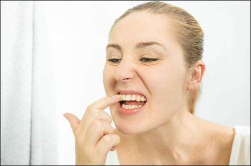 Flossing: Food between teeth